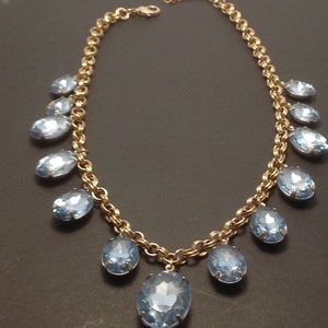 Gorgeous gold tone necklace with blue drops